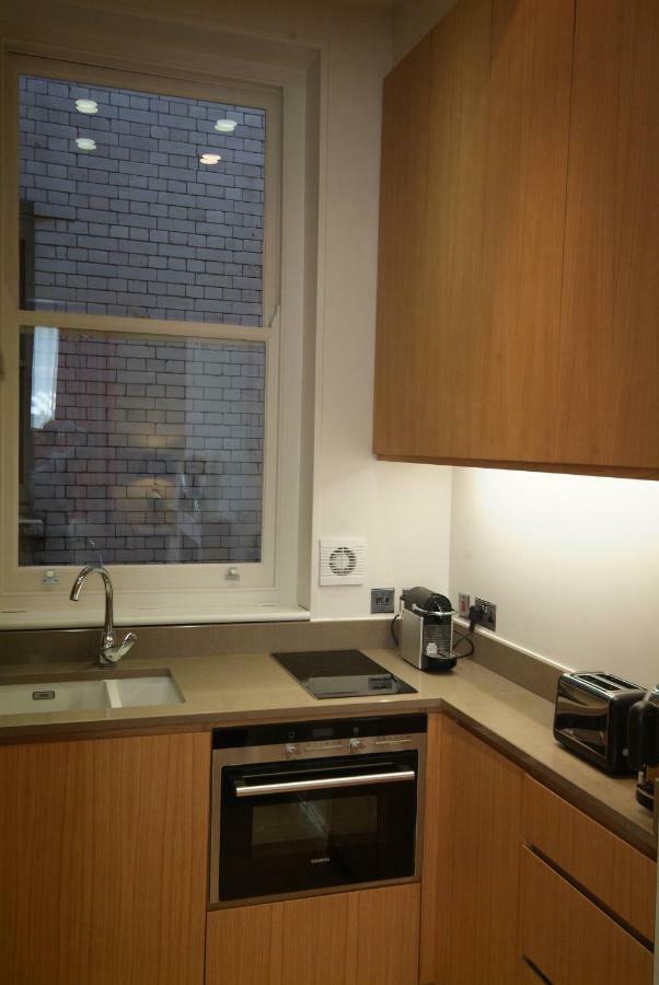 Chelsea: Exceptional 1Br W/Views Of The River Thames & Battersea Park Apartment London Bagian luar foto